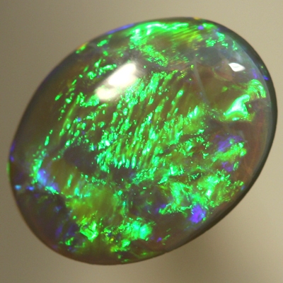 SOLID SEMI BLACK OPAL Very bright forest green over purple. SEE VIDEO